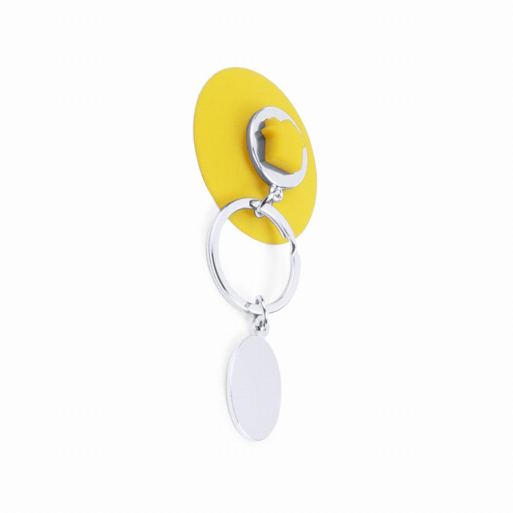 A keyring with a yellow backing, silver ring, and a blank oval tag for customisation. Halman - Image 1