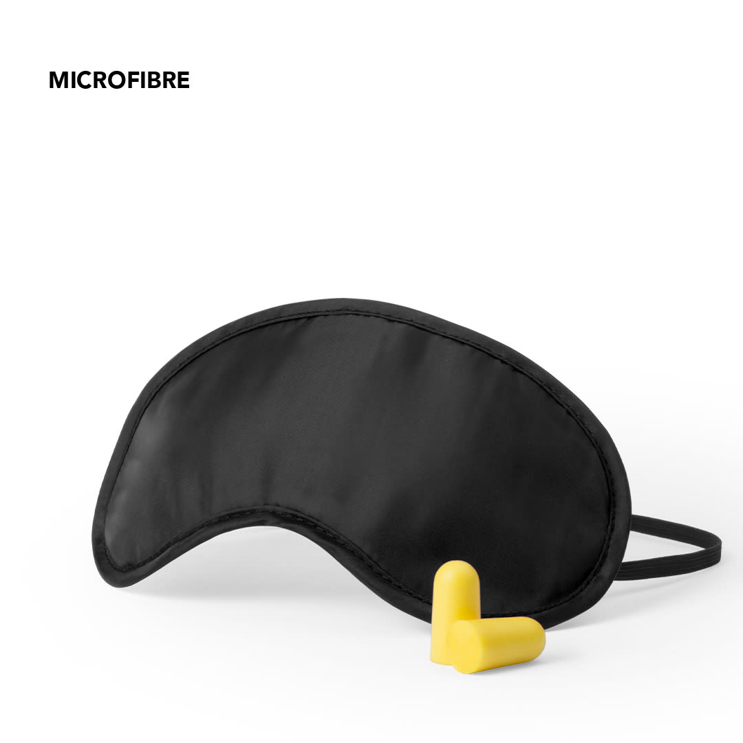 A black sleep mask made of microfibre, accompanied by yellow earplugs. The set is compact and travel-friendly. Yorder Travel Set - Image 1