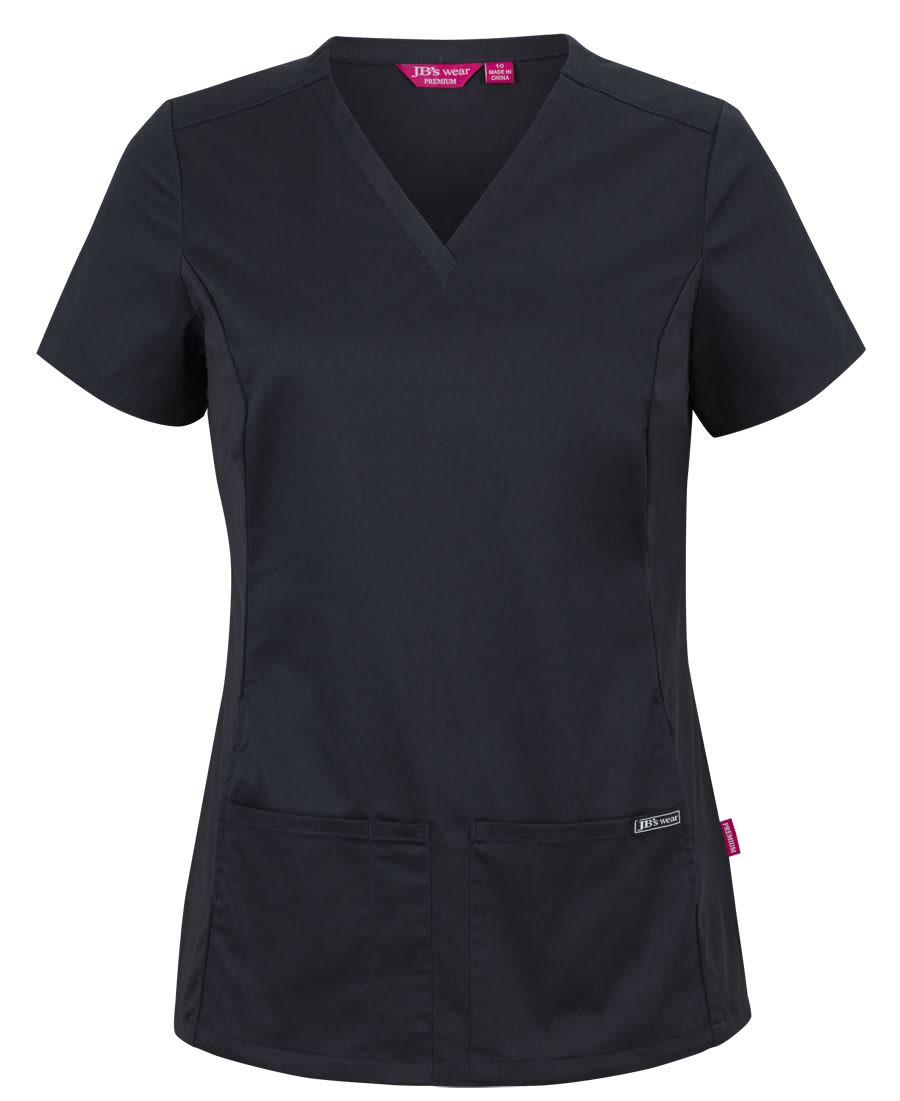 A black scrub top with a V-neck, short sleeves, and pockets, featuring a small logo on the side. JB's Ladies Premium Stretch Panel Scrub Top - Image 1