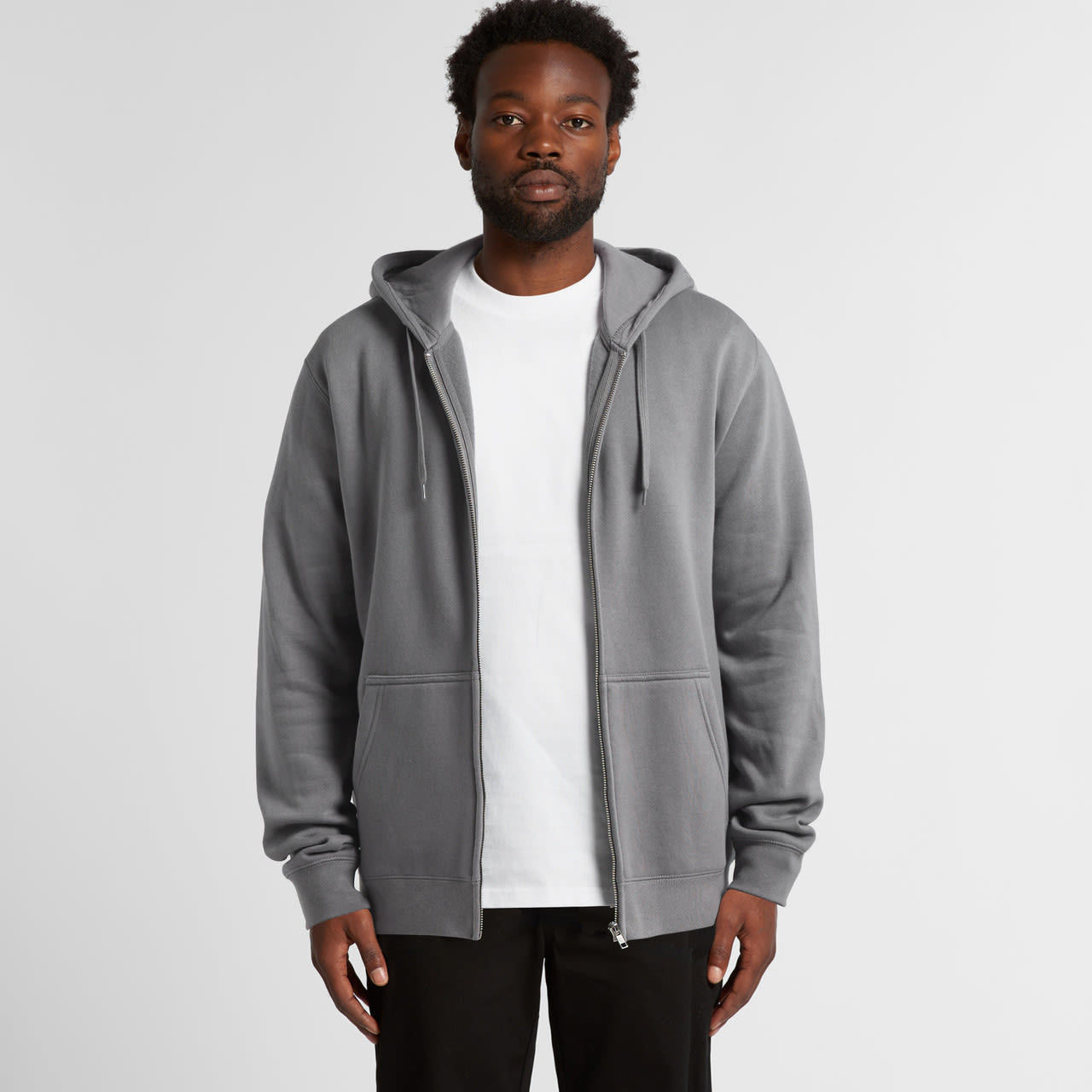A grey zip-up hoodie with a front pocket and drawstring hood, featuring a branding logo. Stencil Zip Hood - Image 1