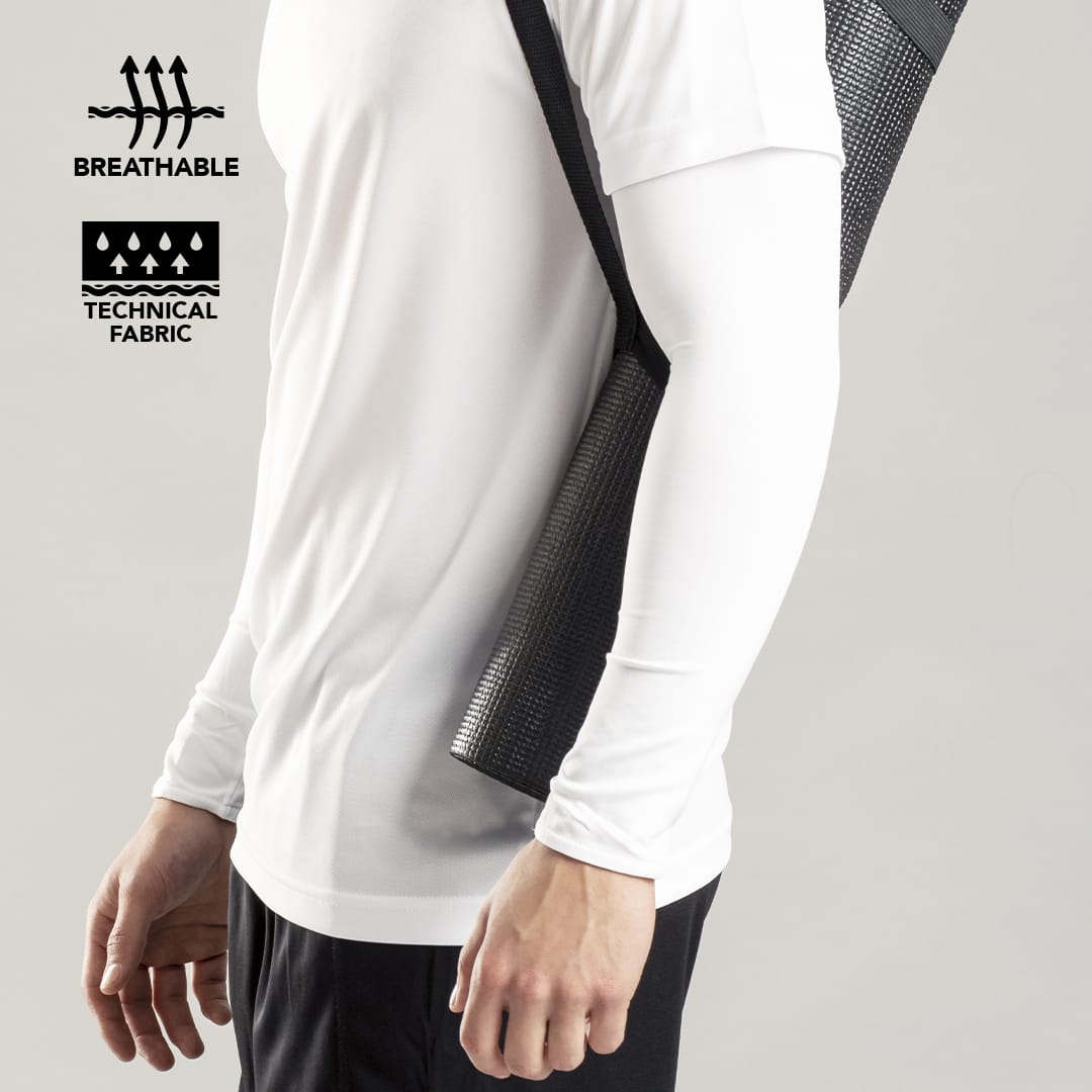 White arm sleeves made of technical breathable fabric, displayed on a person wearing a light top. Duttier Arm Sleeves - Image 1