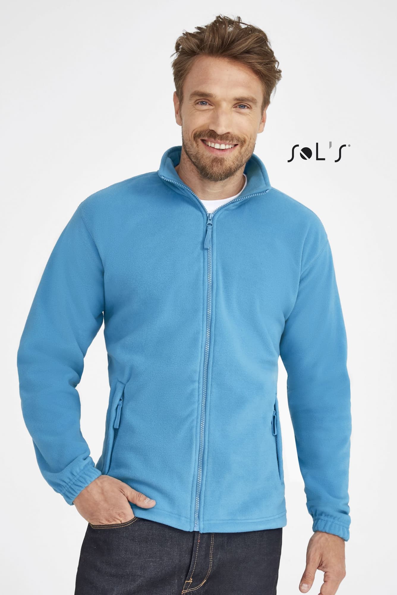 A zipped fleece jacket in bright blue, featuring a high collar and side pockets, modeled by a smiling man. NORTH MEN'S ZIPPED FLEECE JACKET - Image 1