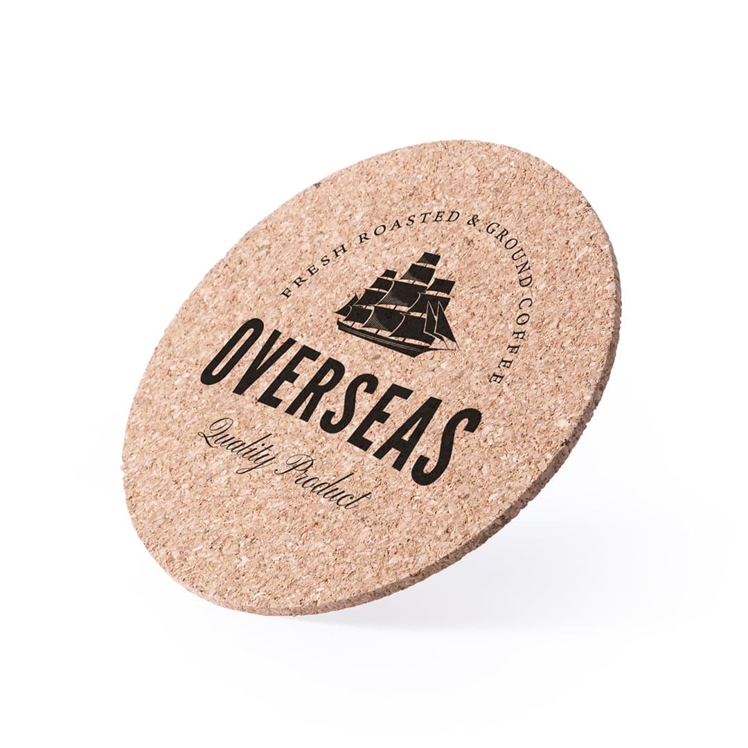 A round cork coaster featuring a ship design and the word "OVERSEAS" in bold lettering. Brunex Coaster - Image 1