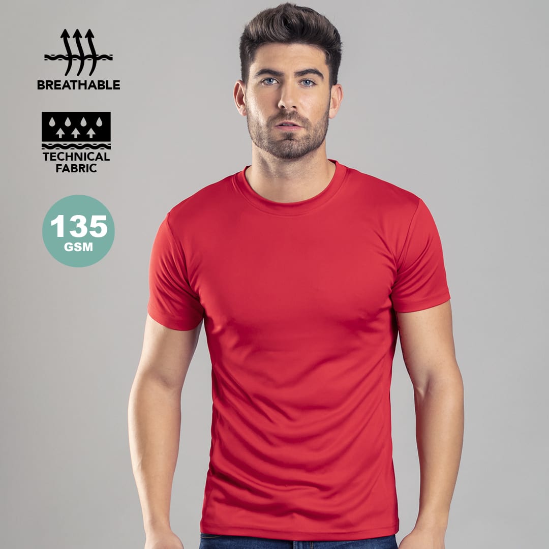 A red adult T-shirt made from breathable technical fabric. It features a logo and a smooth fit. Tecnic Layom Adult T-Shirt - Image 1