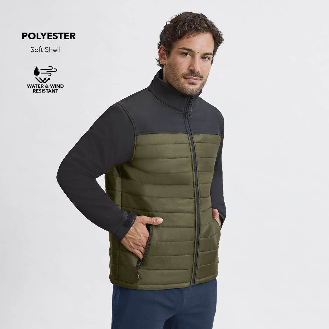 A soft shell jacket in olive green and black, featuring a zip closure and pockets. It has a logo and is water and wind resistant. Cornal Jacket - Image 1