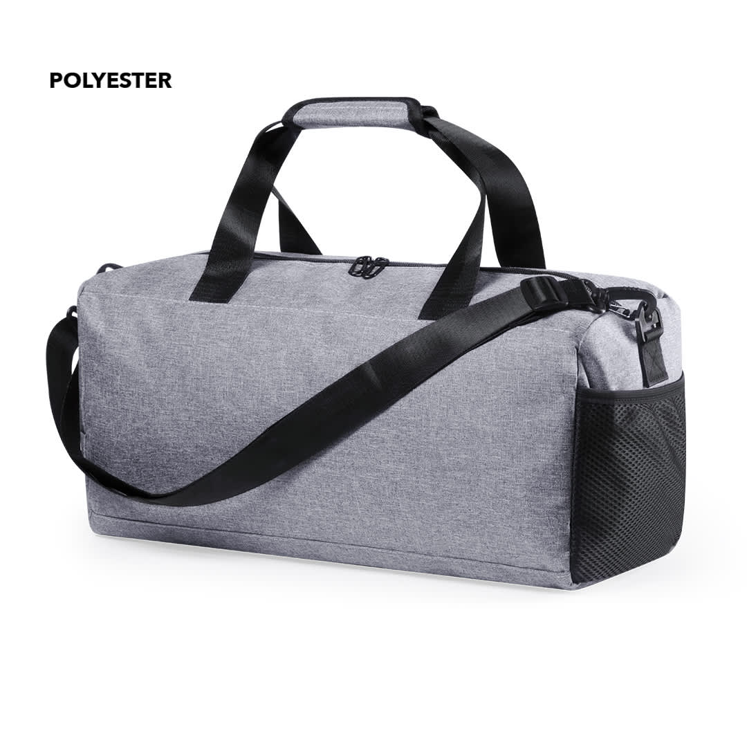 A grey polyester bag with black straps and a mesh side pocket. Features dual handles and a detachable shoulder strap. Lutux Bag - Image 1