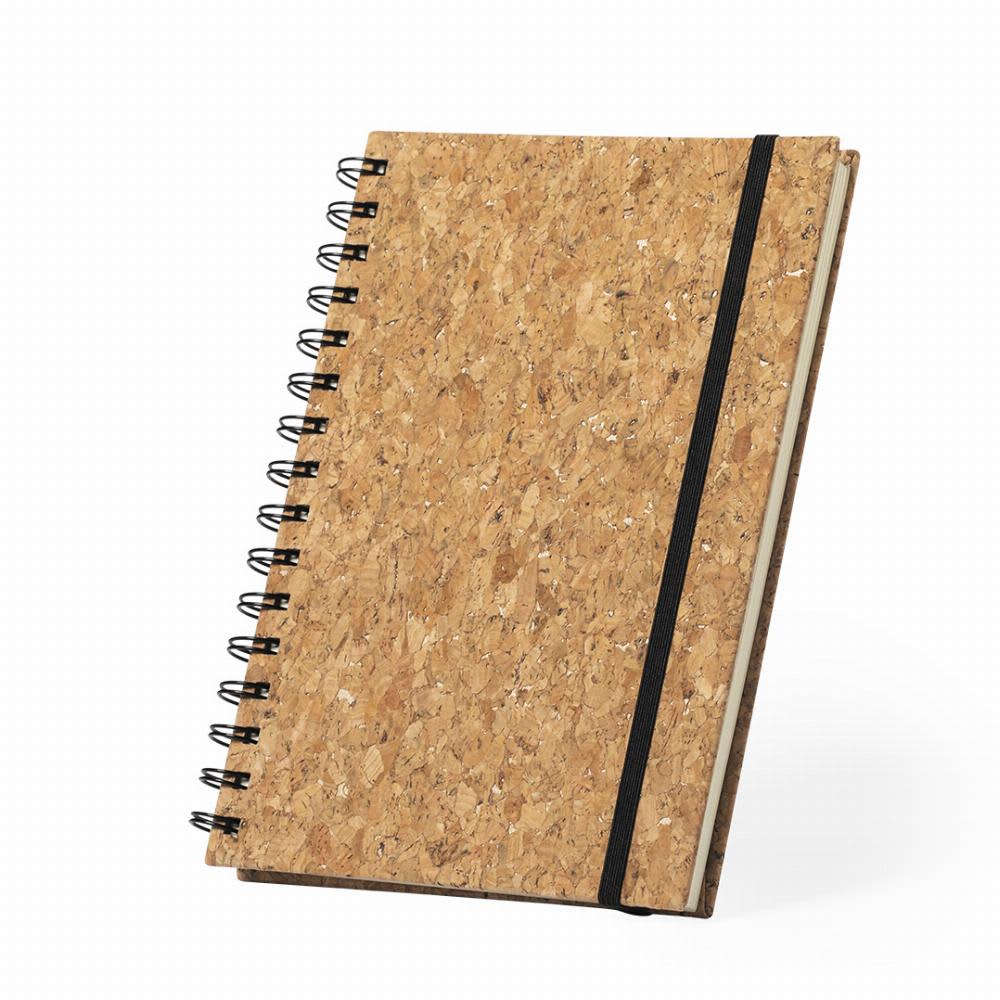 A cork notebook with spiral binding and an elastic band closure. It features a natural, textured surface. Xiankal - Image 1