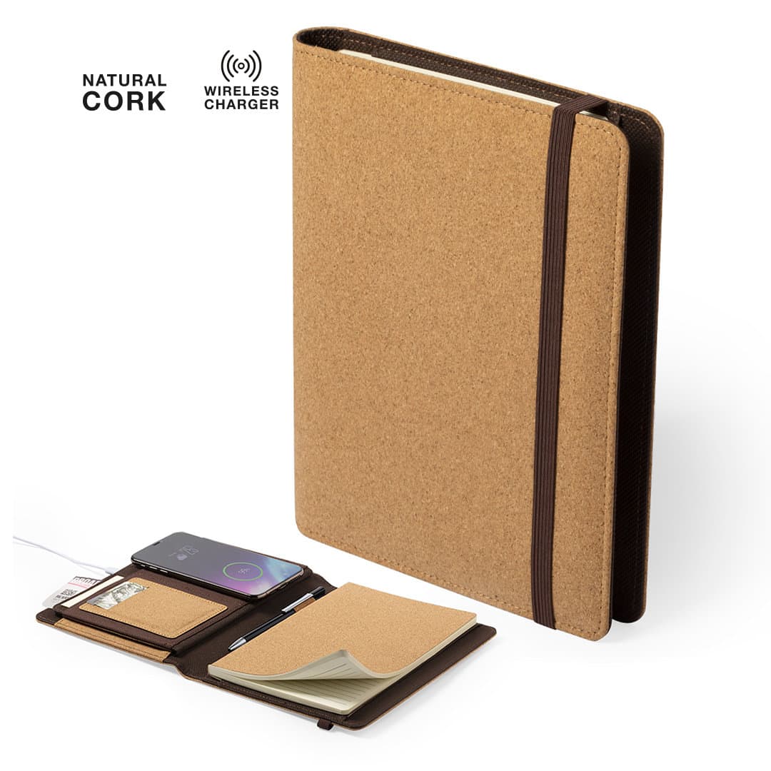 A cork notepad in tan with a dark brown elastic band, featuring a wireless charger and interior pockets. Toskan Charger Notepad - Image 1