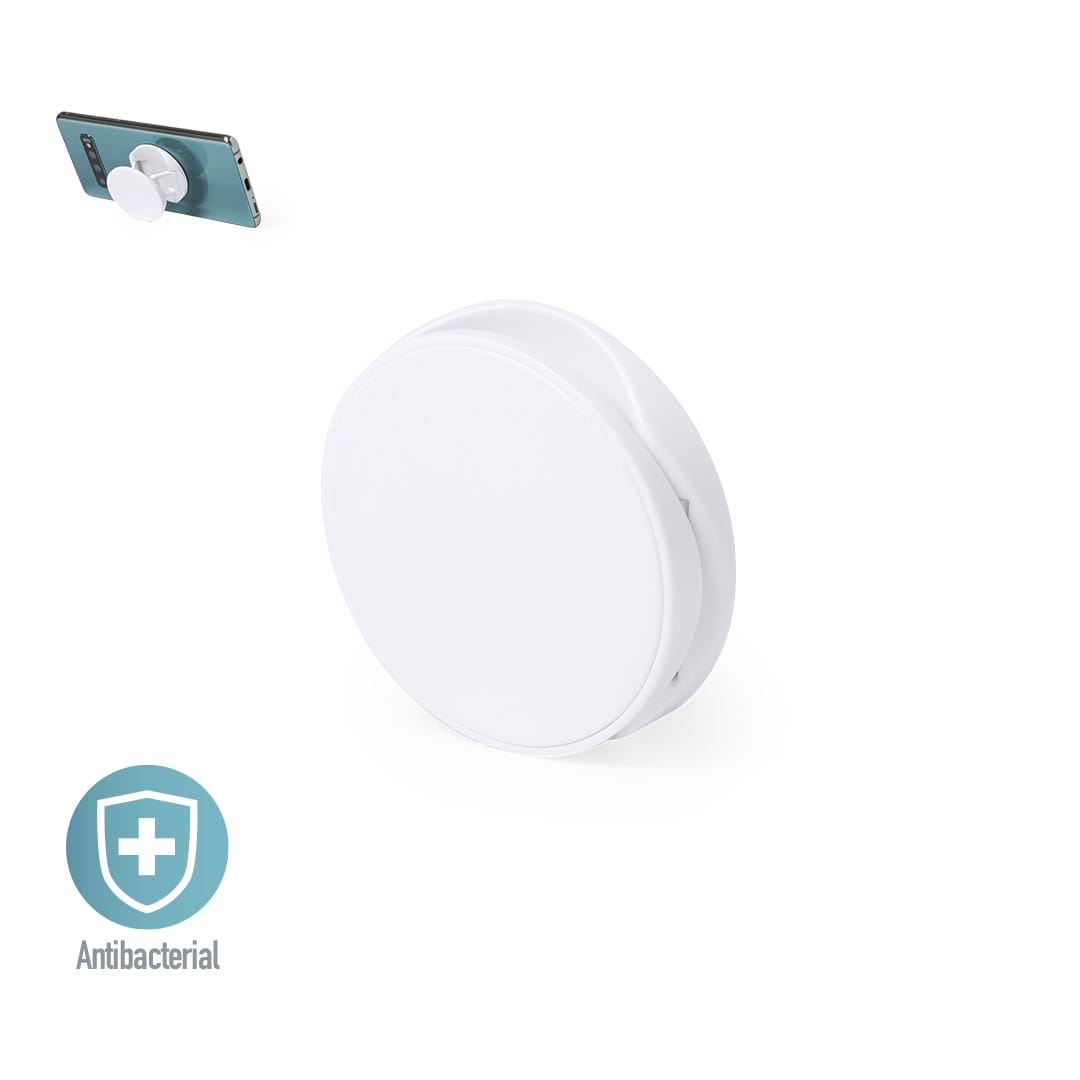 A white antibacterial phone holder with a circular design, positioned next to a smartphone. Kumol Antibacterial Holder - Image 1