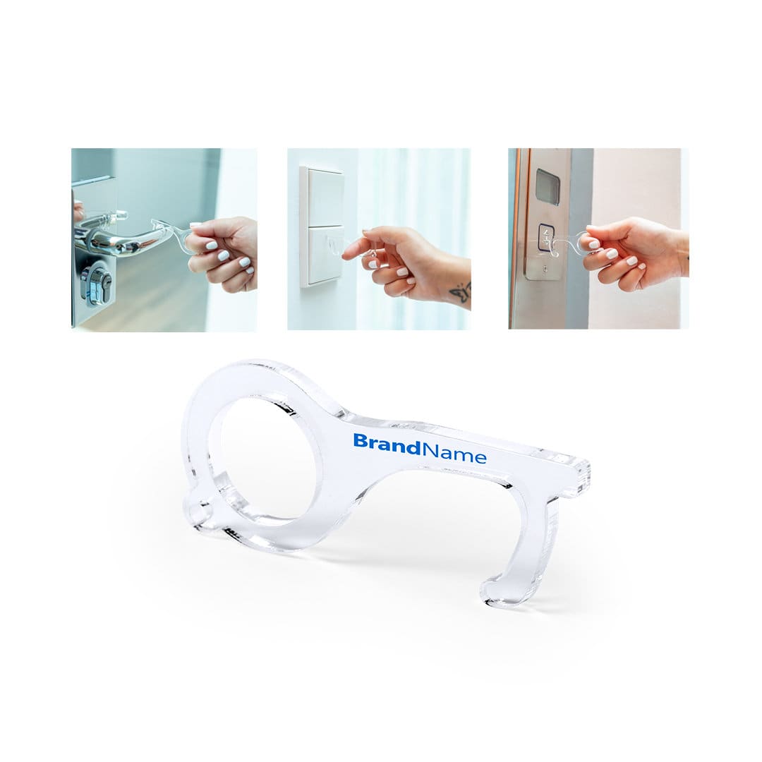 A clear plastic keyring tool with a handle, designed to prevent direct contact with surfaces. It features a logo. Napil Keyring Anticontact - Image 1