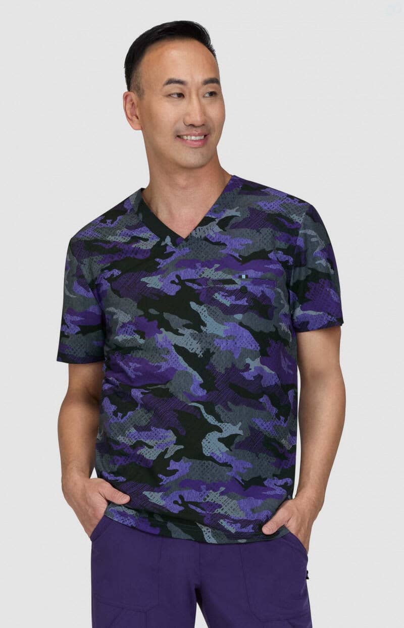 A short-sleeved, v-neck shirt featuring a black and purple camouflage pattern, designed for men. It has a logo on the sleeve. On Call Top (Print) - Image 1