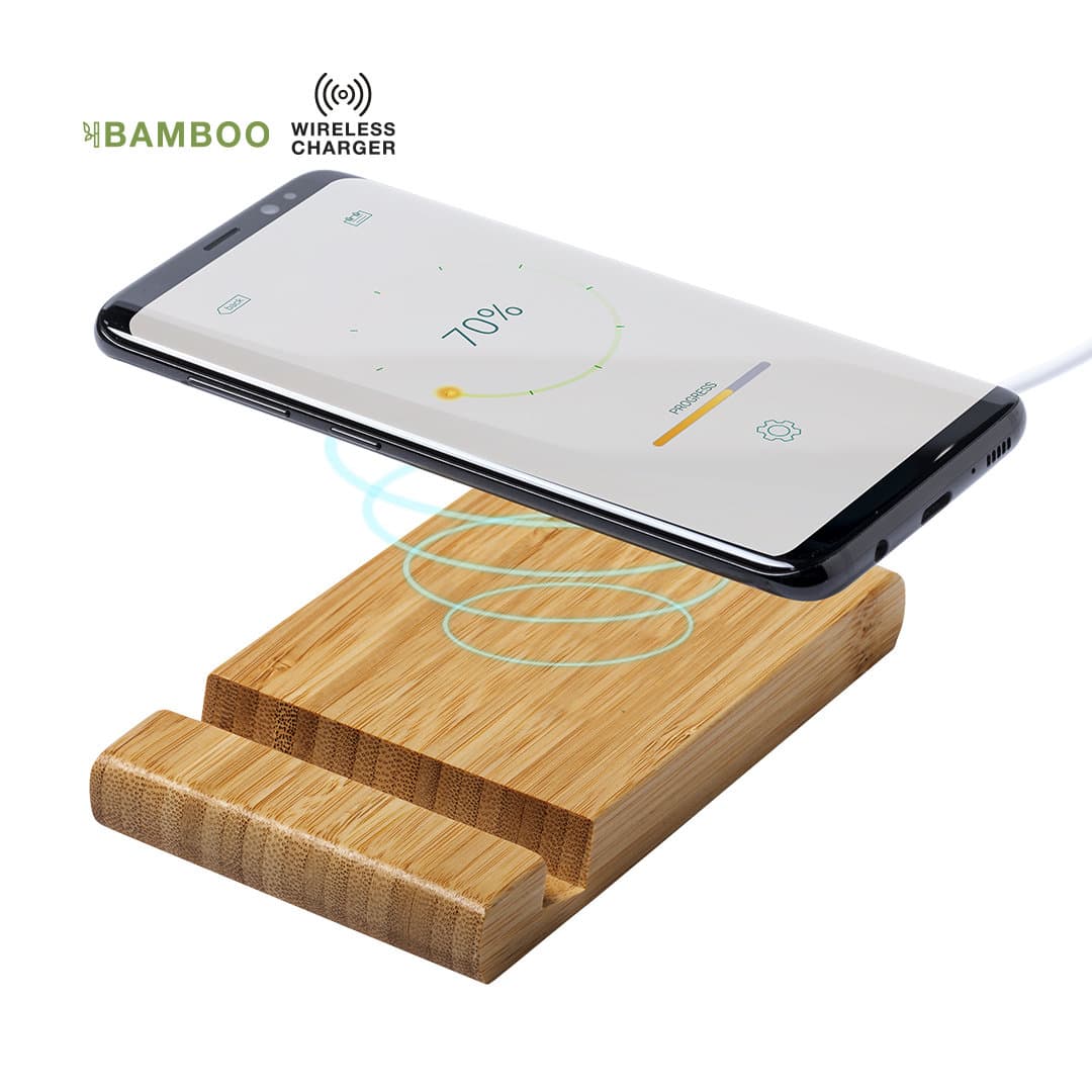A bamboo wireless charger in a natural finish, with a smartphone positioned above it. Vartol Charger - Image 1