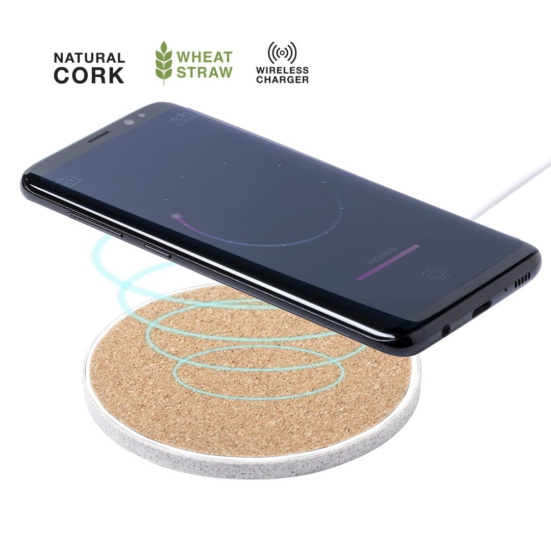 A wireless charger with a natural cork surface and white base, featuring a sleek black smartphone placed on top. Livor Charger - Image 1