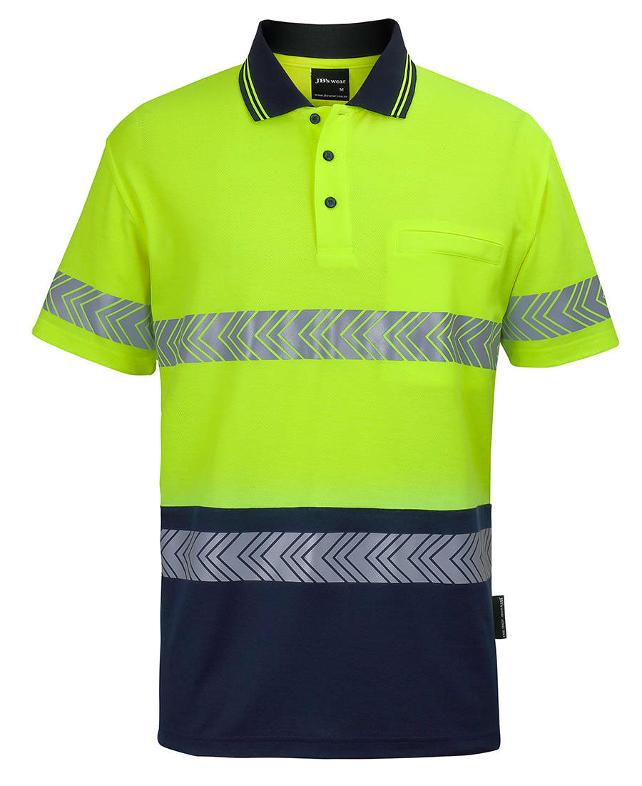 A lime green and navy segmented tape polo shirt with reflective stripes and a chest pocket. It features a collar and buttons. JB's Hv S/S D+N C/Back Segmented Tape Polo - Image 1