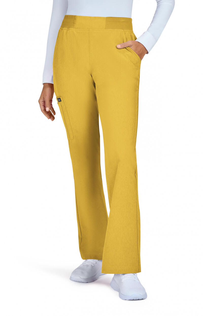 A pair of yellow pants with a straight leg style and pockets, displayed on a model. Wrenlee Pant - Image 1