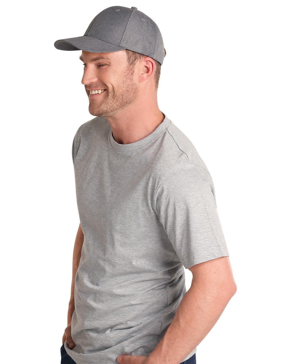 A grey cap with a curved brim, modeled by a smiling man wearing a grey t-shirt. The cap features a logo. Premium Heather Polyester Baseball Cap - Image 1