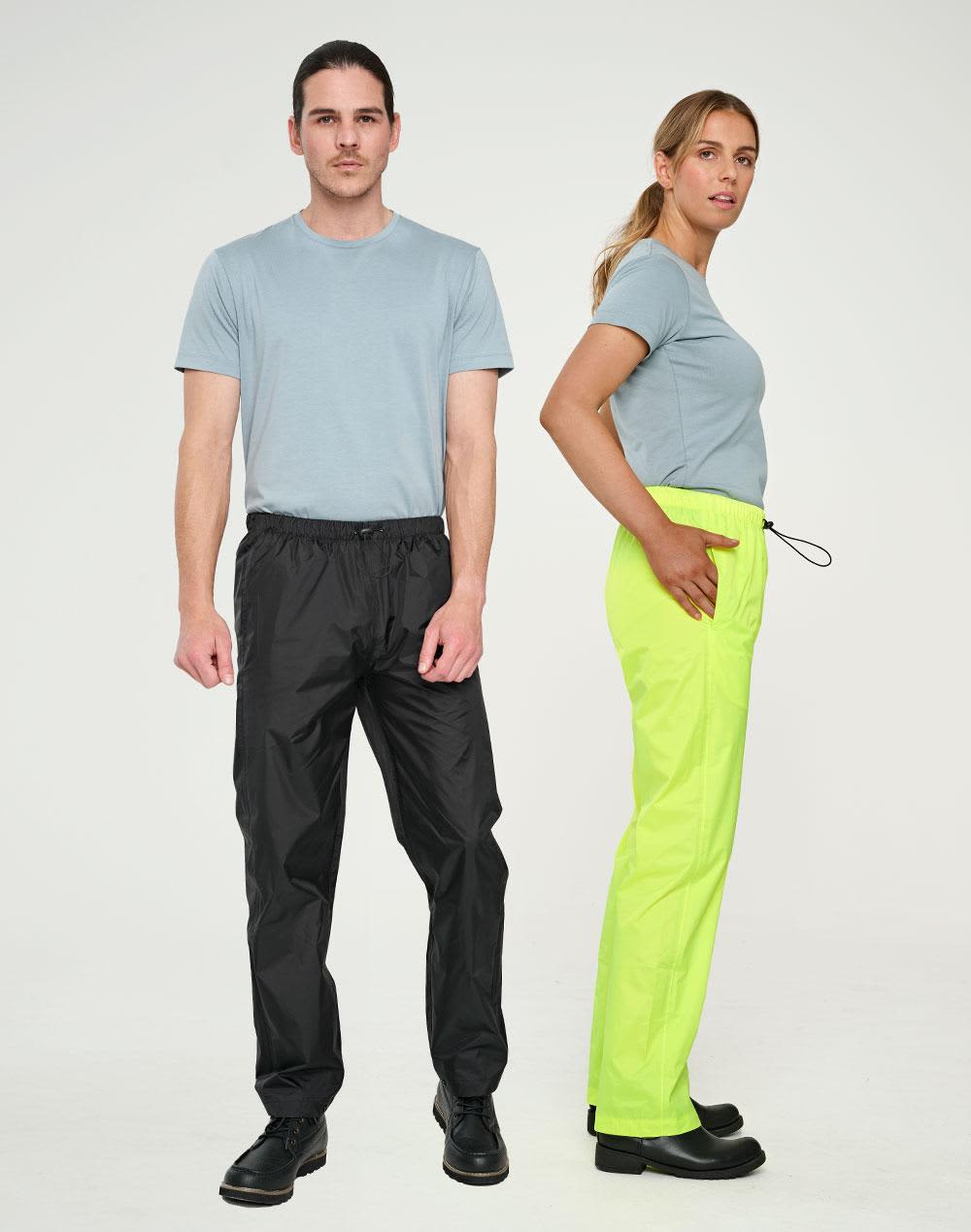 Lightweight nylon waterproof rain pants in black and bright yellow, displayed on models wearing casual grey t-shirts. Light Weight Nylon Waterproof Rain Pants - Image 1