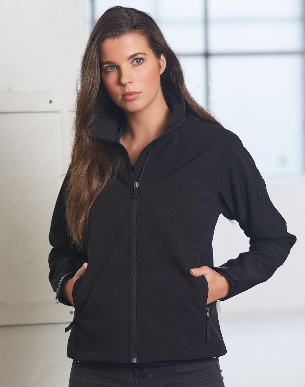 A black softshell jacket for ladies, featuring a zip front and side pockets, with a fitted design. Ladies Softshell Hi-Tech Jacket - Image 1
