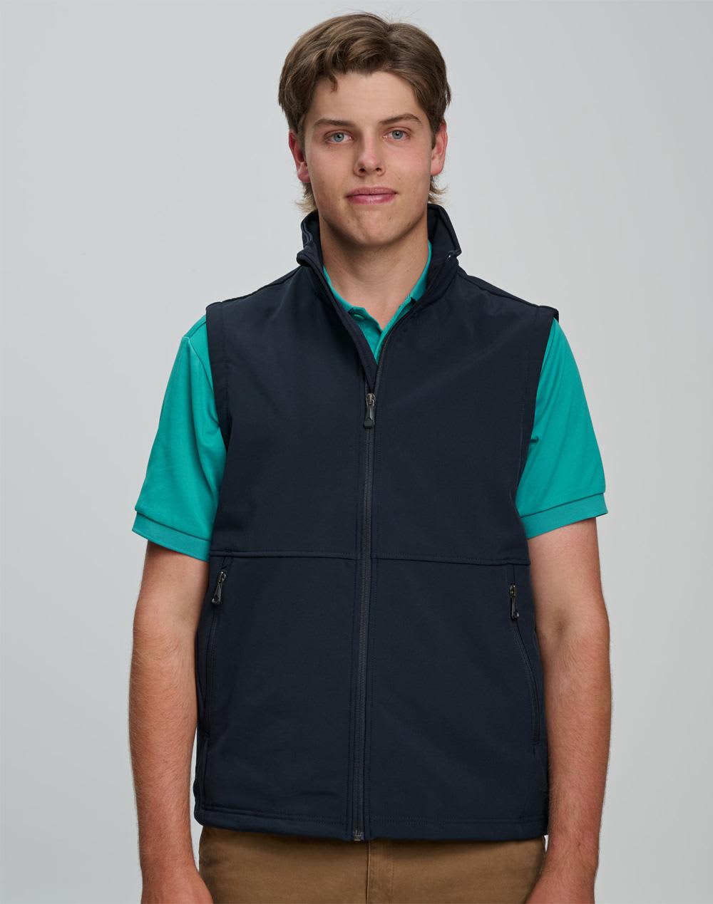 A men's softshell hi-tech vest in navy blue, featuring a zip front and side pockets, worn over a black t-shirt. Men's Softshell Hi-Tech Vest - Image 1