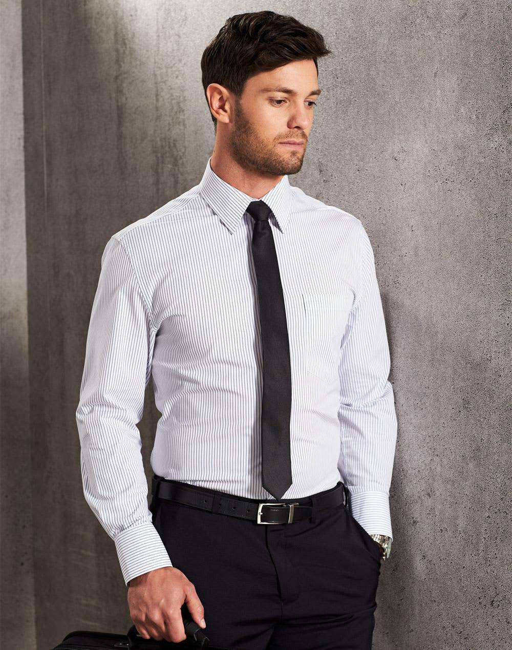 A men's long sleeve button-up shirt in white with navy ticking stripes, paired with a black tie and trousers. Men's Ticking Stripe L/S Shirt - Image 1