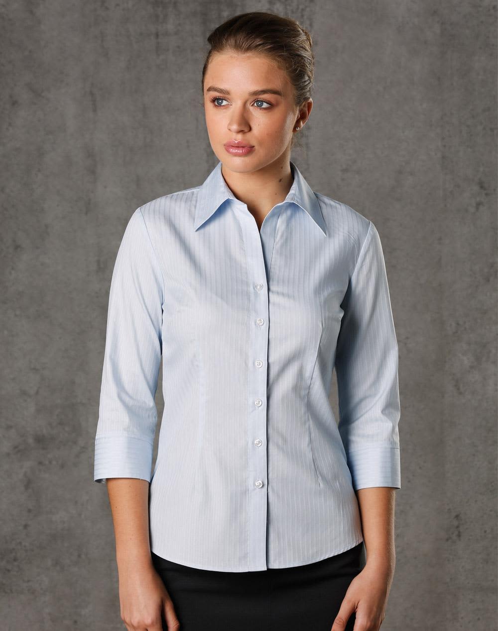 A light blue women's 3/4 sleeve button-up shirt with a self-stripe pattern and a logo. Women's Self Stripe 3/4 Sleeve Shirt - Image 1