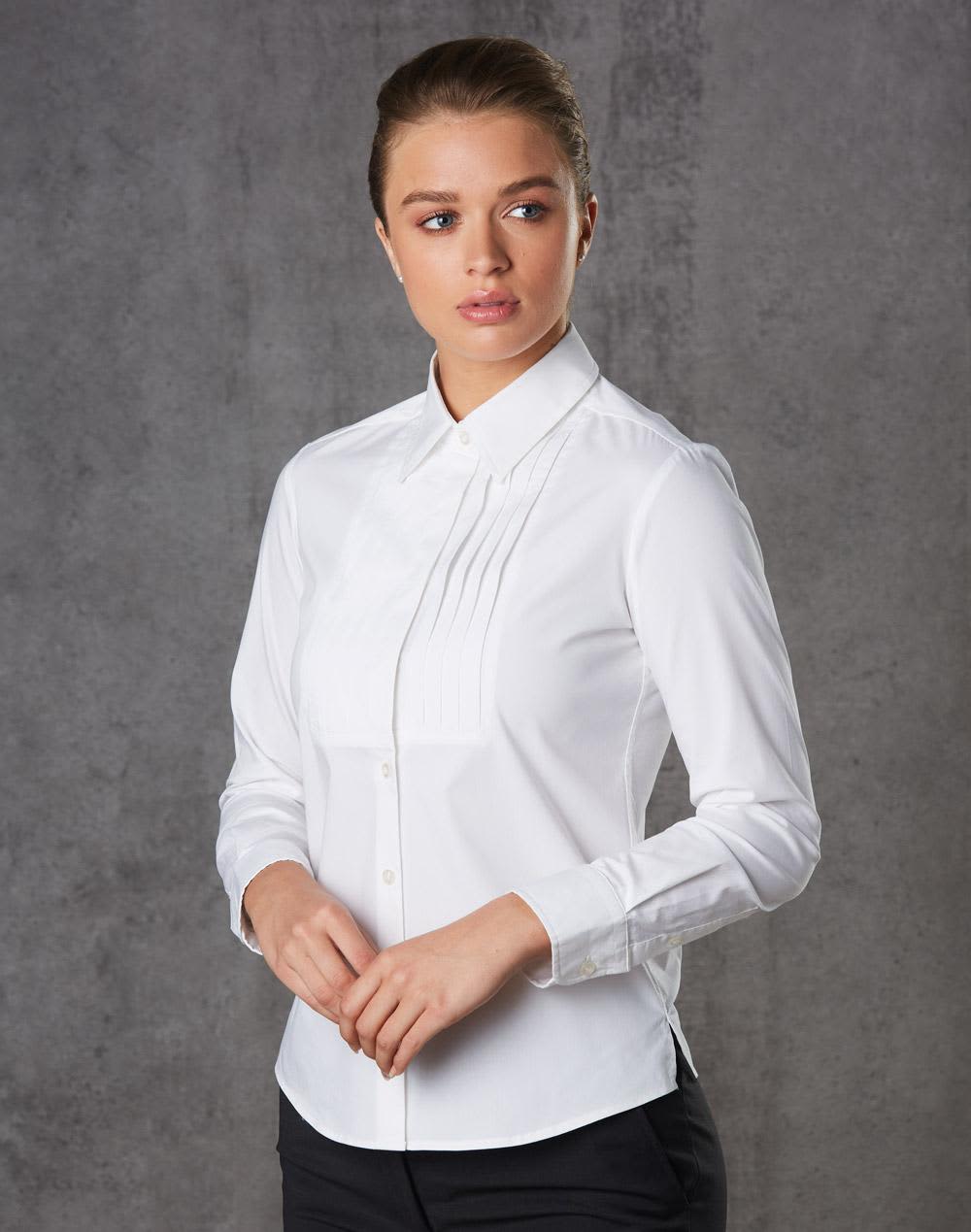 A white long sleeve button-up shirt with a tuck front design, featuring a branding logo. Women's Stretch Tuck Front Long Sleeve Shirt - Image 1