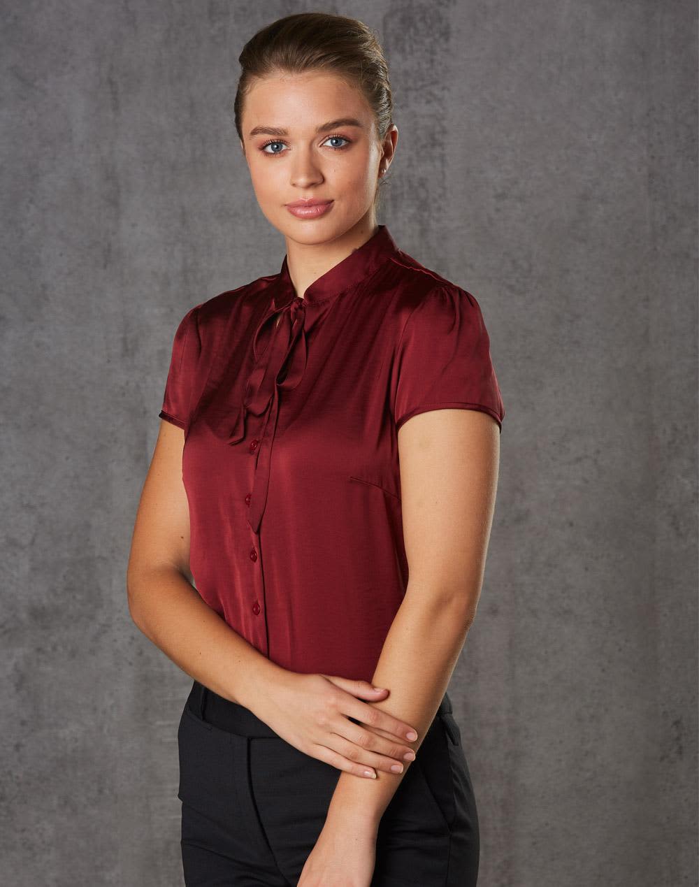 A maroon women's tie neck blouse with short sleeves, featuring a button-down front and a sleek, polished design. Women's Tie Neck Blouse - Image 1