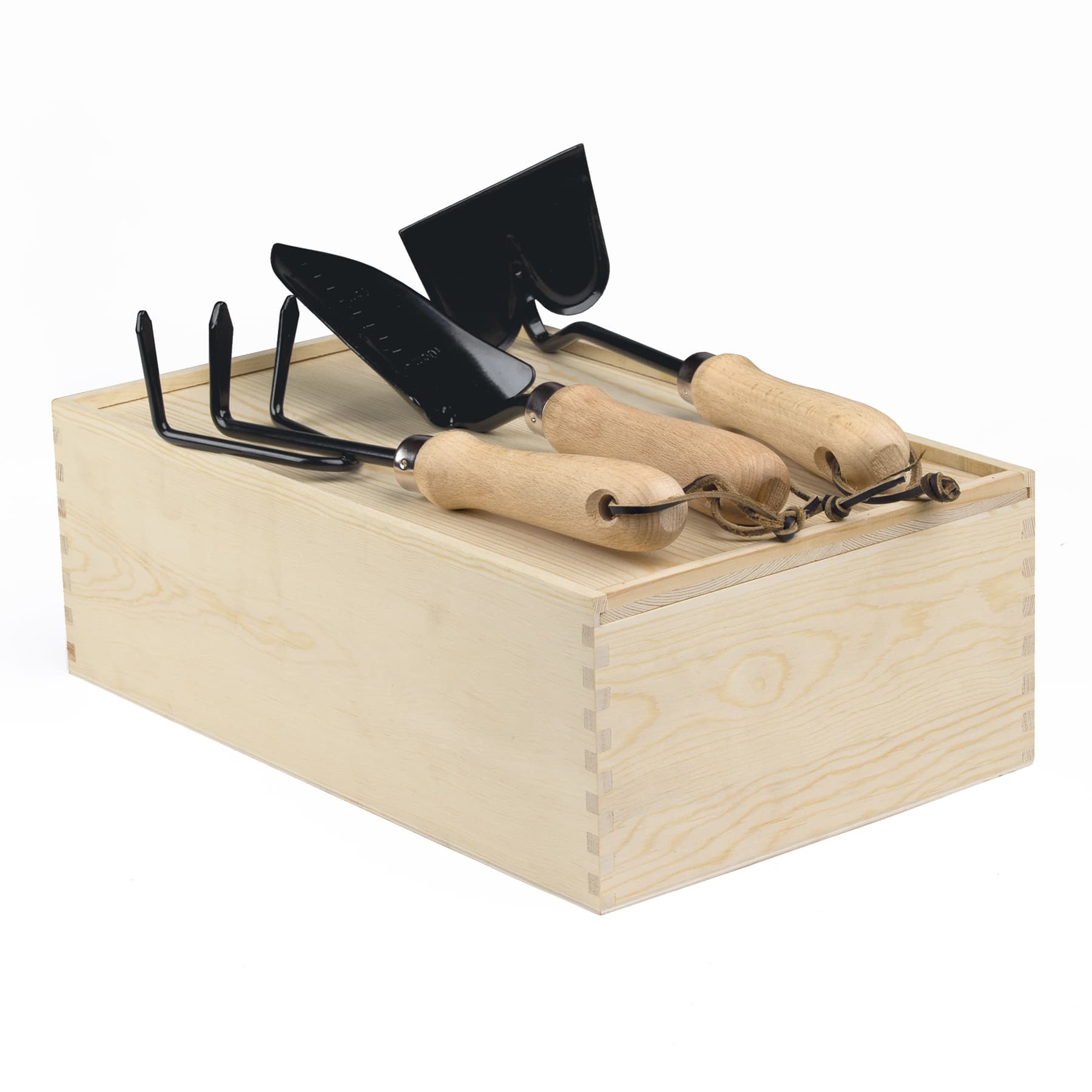 A wooden garden box containing three gardening tools with wooden handles and metal heads. Dig It Garden Box - Image 1