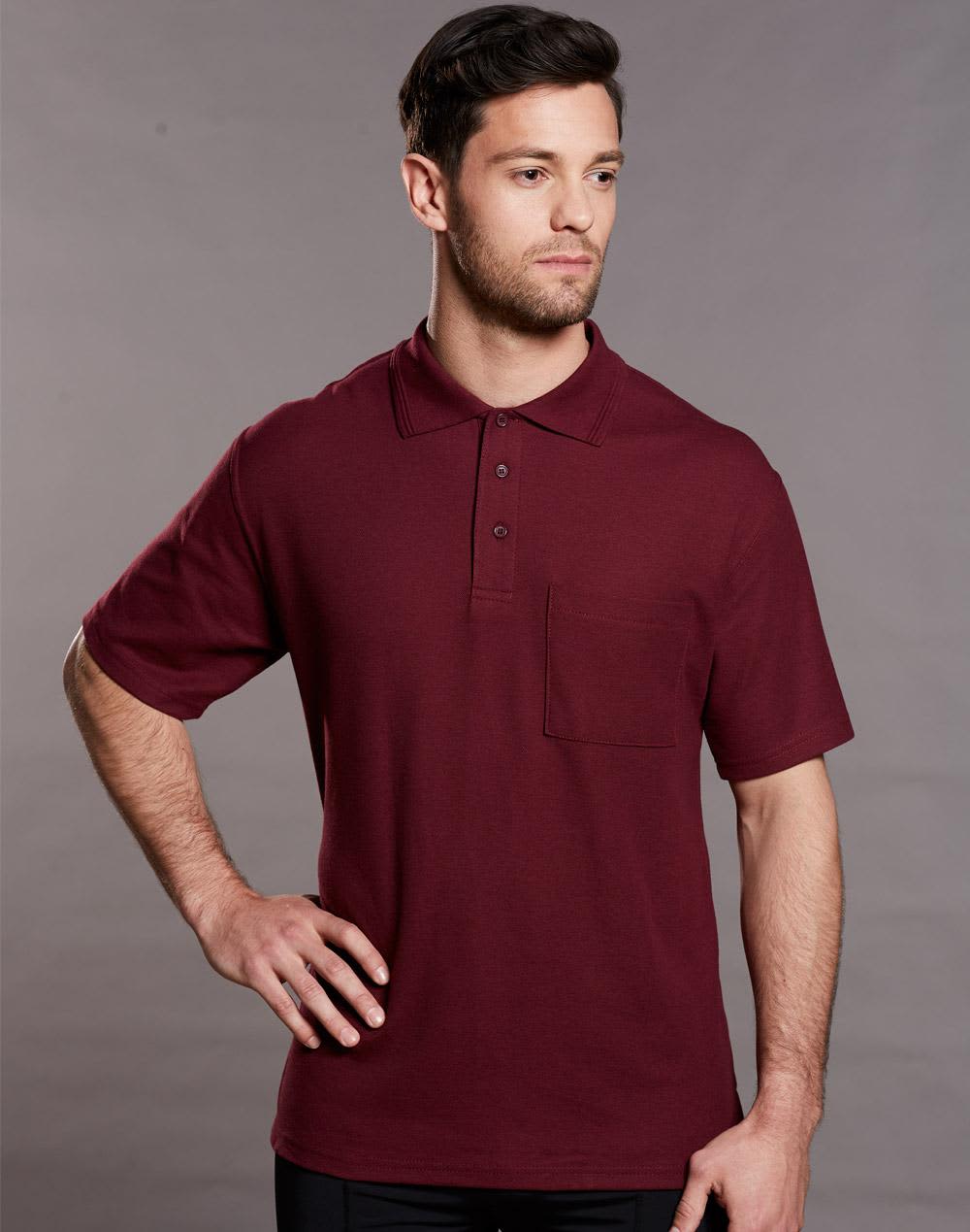 A maroon short sleeve polo shirt with a pocket and a logo on the chest. Pocket short sleeve polo - Image 1