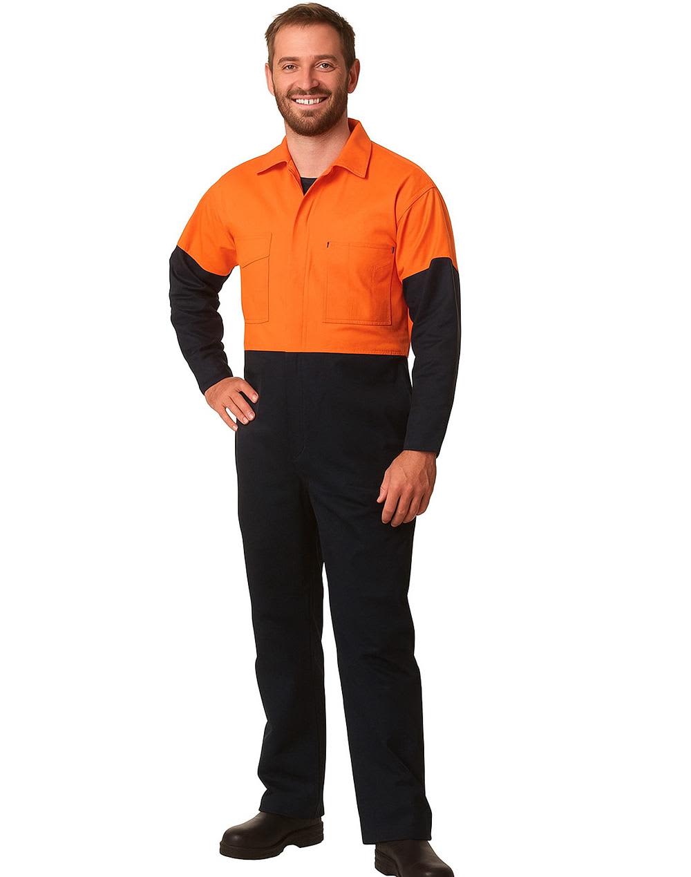 A man is wearing a Hi-Vis two-tone cotton drill coverall, featuring orange and navy blue colours. It has a logo. Hi-Vis Two Tone Men's Cotton Drill Coverall-Stout - Image 1