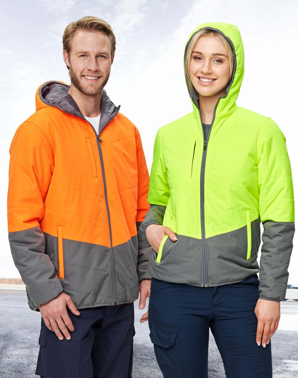 A bright orange and grey quilted safety jacket with a hood, alongside a lime green and grey version, both featuring logos. Hi-Vis Quilted Two Tone Safety Jacket - Image 1