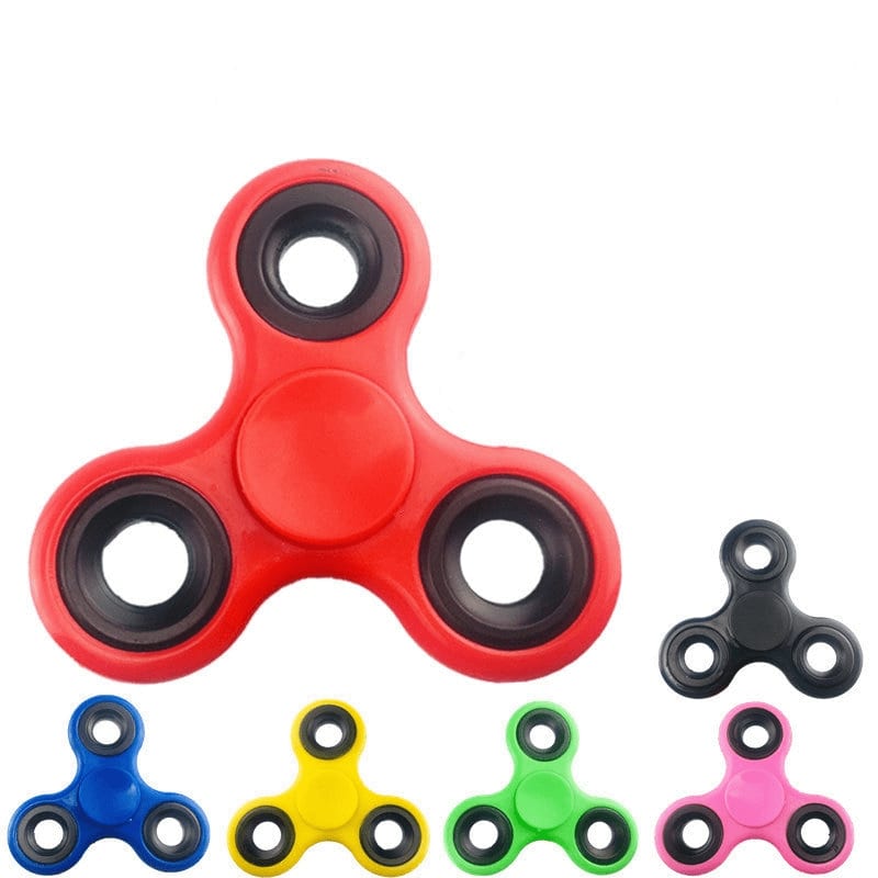 A red fidget spinner with black bearings, surrounded by green, blue, yellow, and pink spinners. Fidget Spinner - Image 1