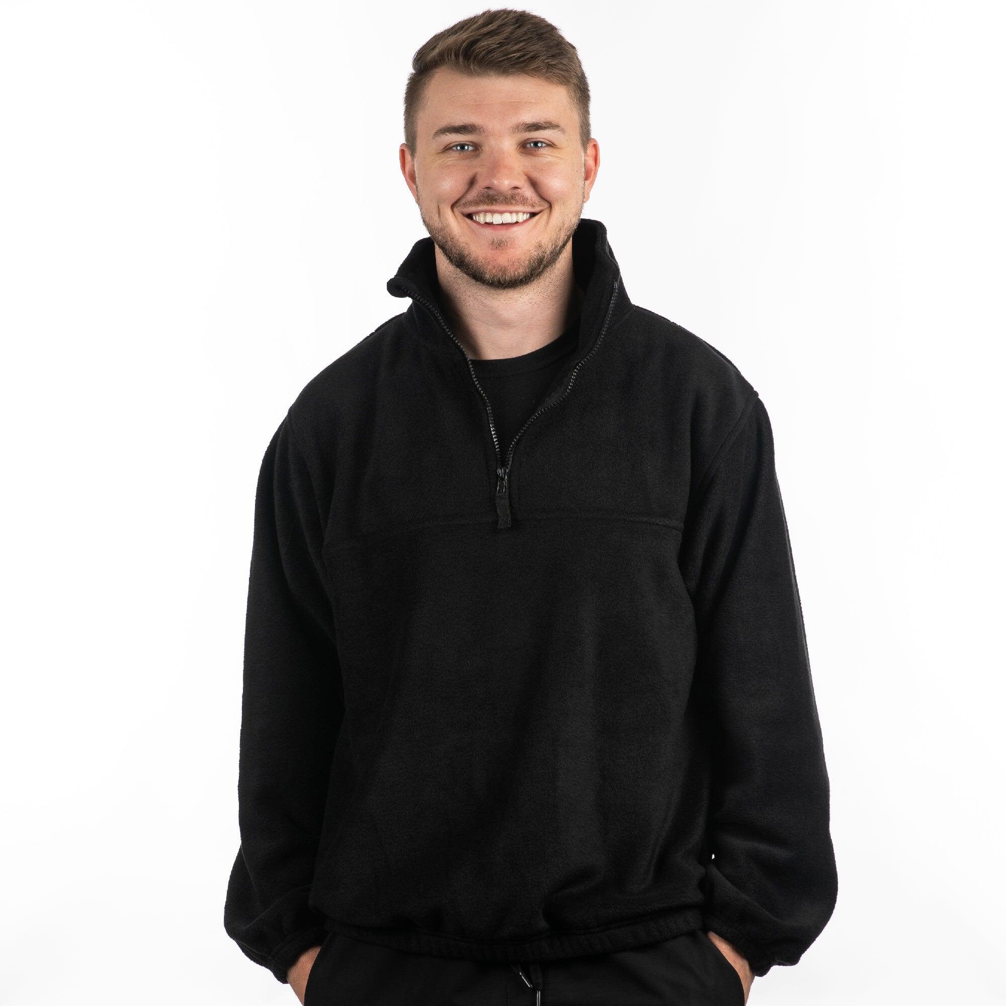 A black 1/4 zip polar fleece pullover worn by a smiling man, featuring a high collar and relaxed fit. 1/4 Zip Polar Fleece Pullover - Image 1