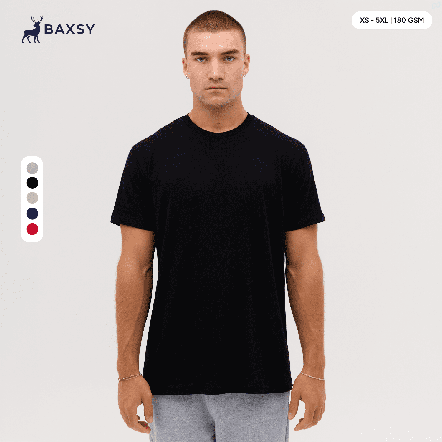 A black T-shirt featuring a classic fit, with a logo present, displayed on a model against a neutral background. Event Tee - Image 1