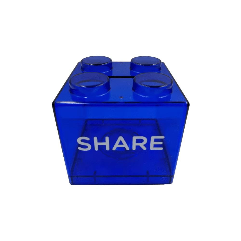 A blue building block money-saving box featuring four raised sections on top and a branding logo. Building Block Money Saving Box - Image 1