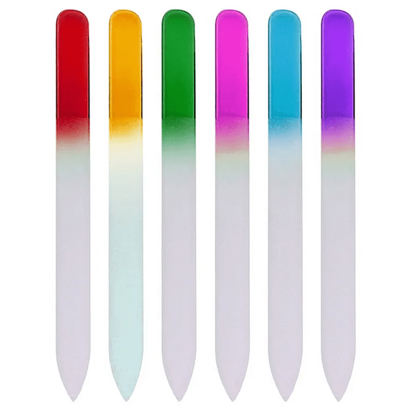 A set of six glass nail files in various colours: red, yellow, green, pink, and purple, with a transparent base. Glass Nail File - Image 1