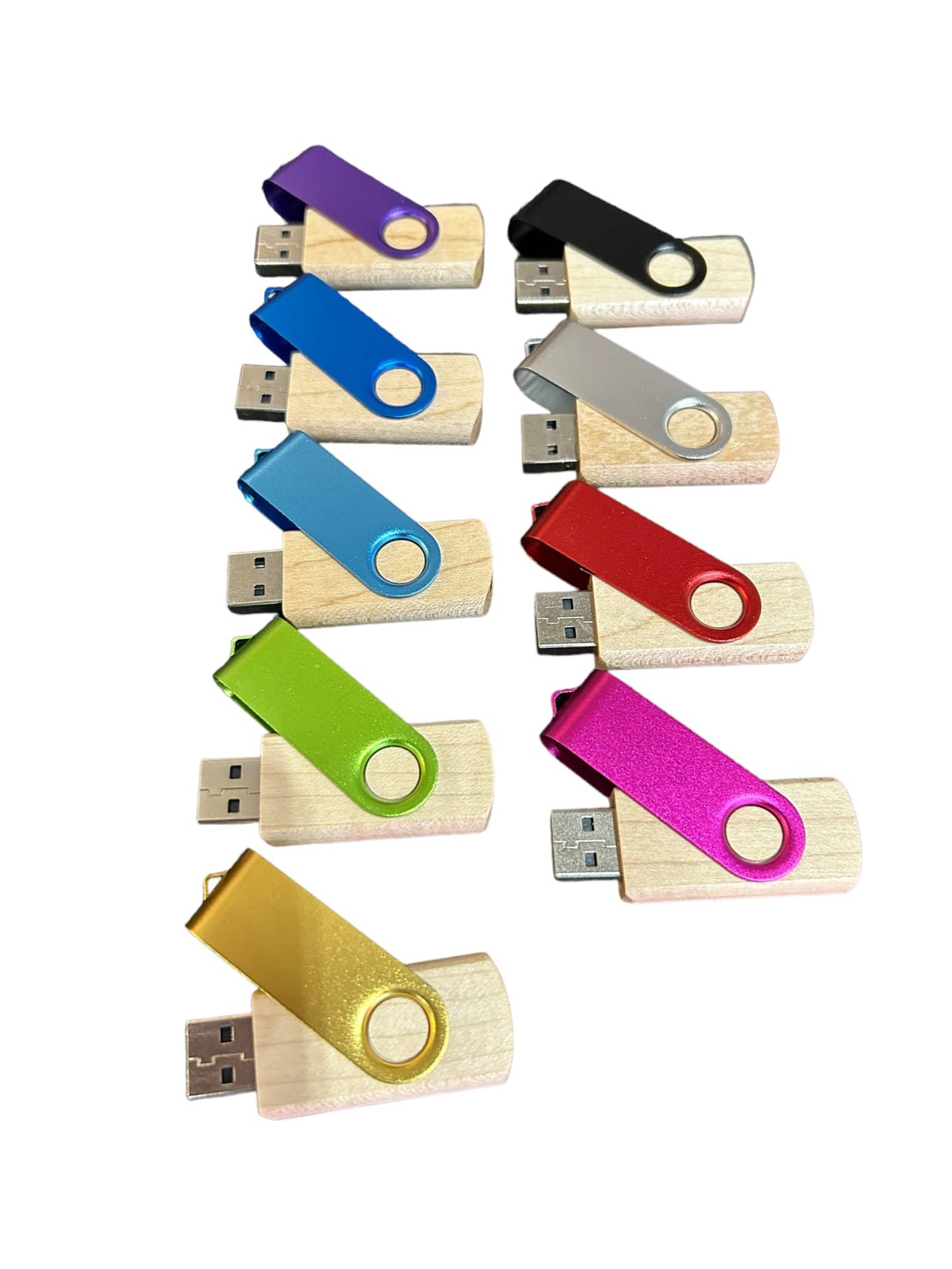 A collection of 10 wooden flash drives in various colours, each with a coloured swivel cap and a USB connector. Elements 32GB Wooden Flash Drive - Image 1
