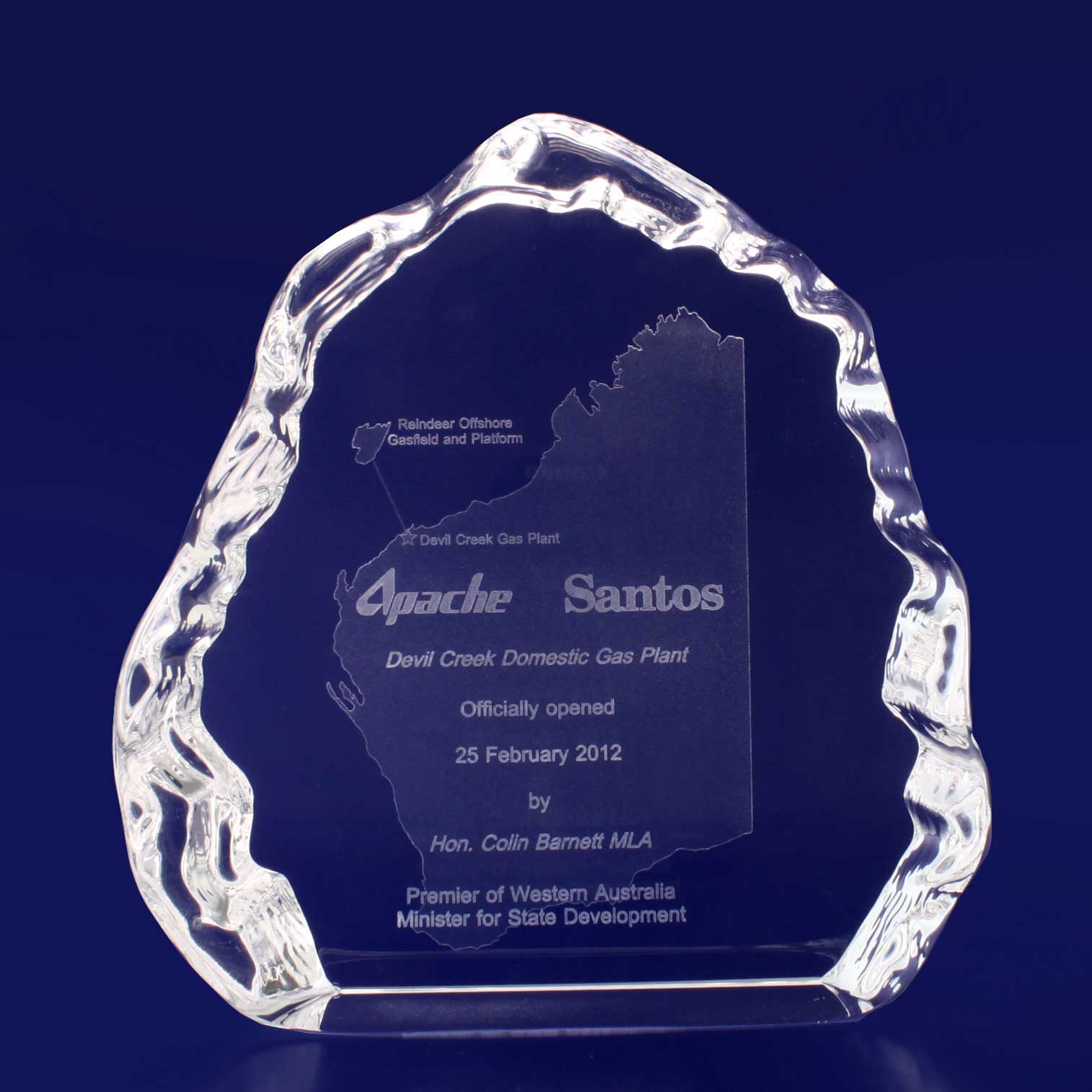 A clear crystal award in a jagged, ice-like shape featuring engraved details and a logo. 3D Crystal Ice Crystal - Image 1