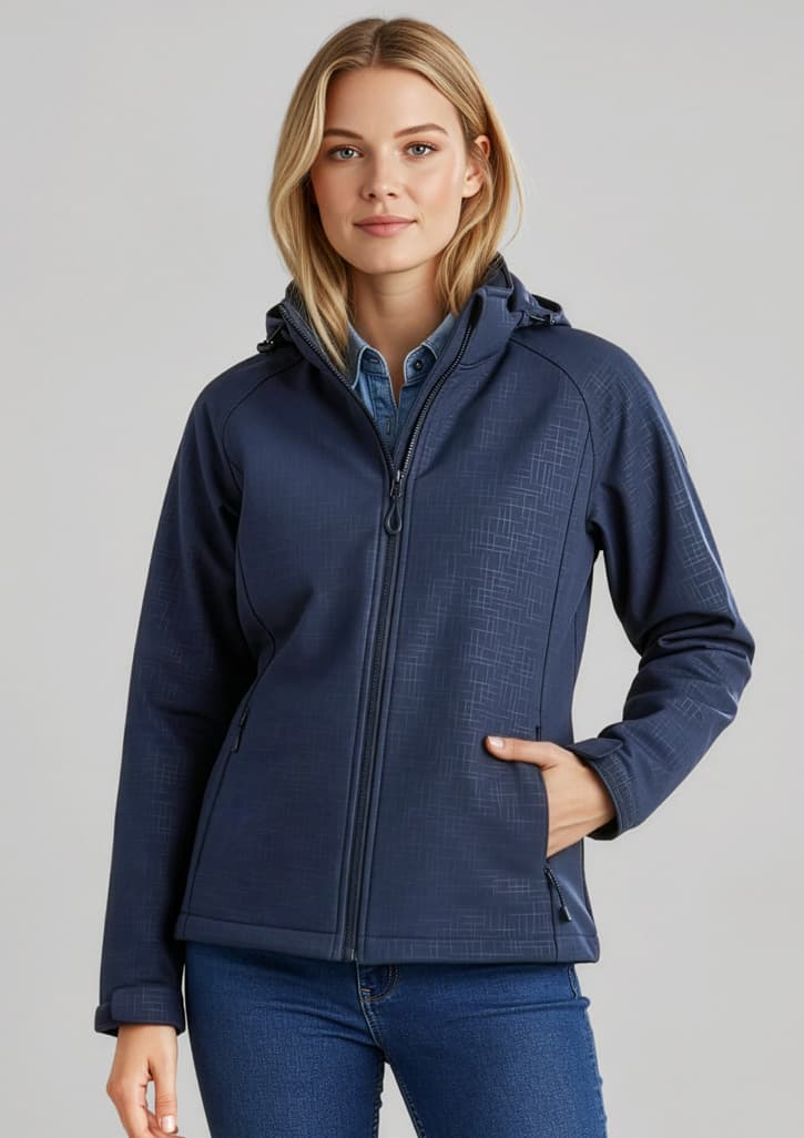 A navy blue soft shell jacket featuring a hood, zip front, and side pockets, worn by a model. Womens Geo Jacket - Image 1