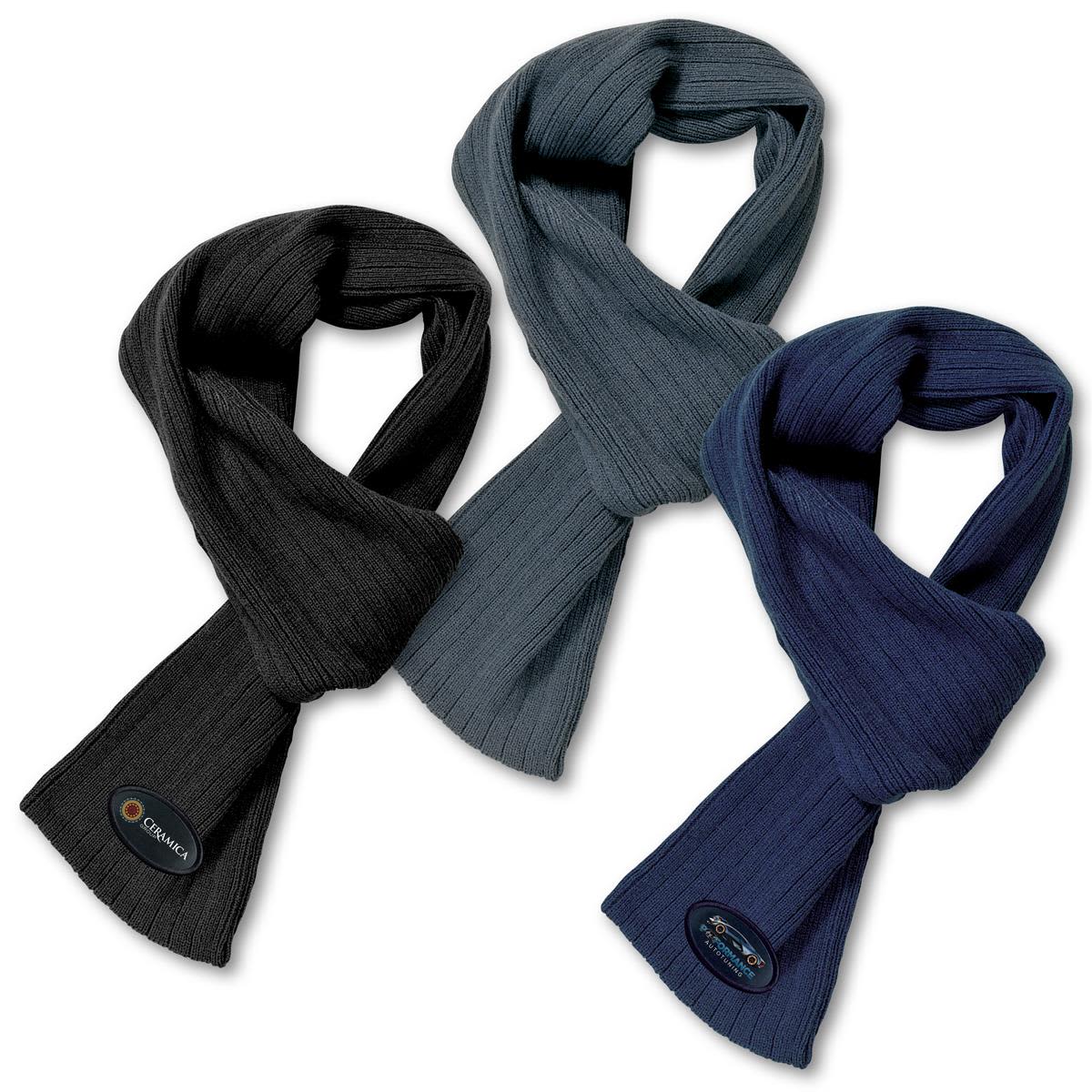 Three cable knit scarves in black, grey, and navy, featuring a logo on each. Cable Knit Scarf - Image 1