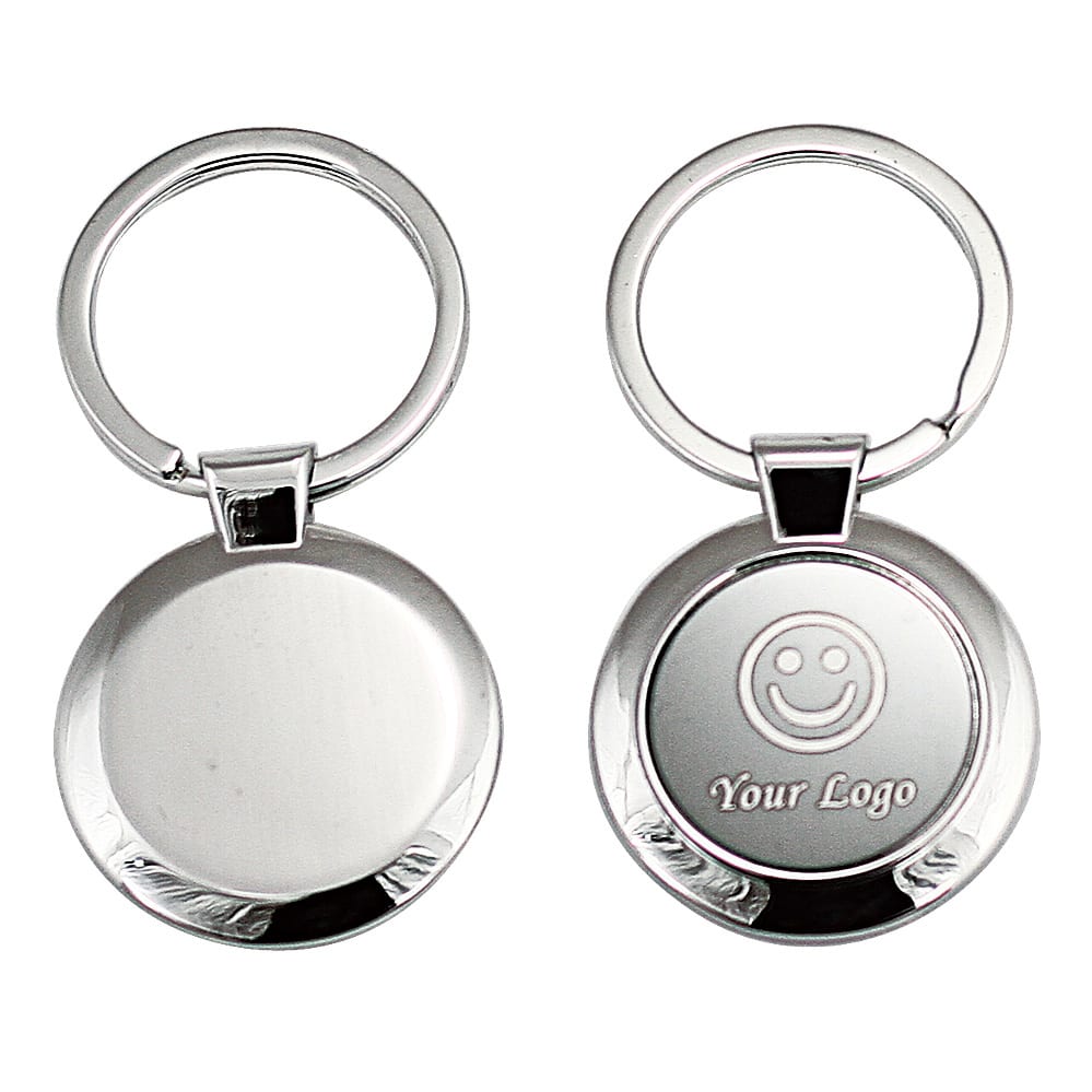 A keyring featuring a circular metal design with a shiny silver finish and a space for custom branding. Carlson keyring - Image 1