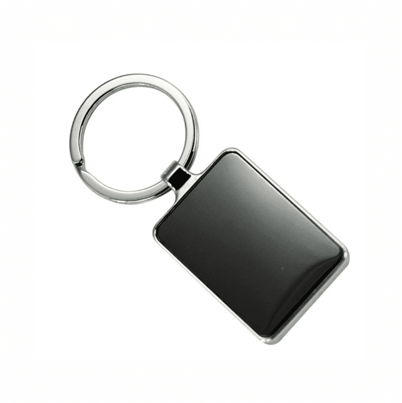 A keychain featuring a sleek rectangular metal pendant with a shiny black surface and a circular keyring. Eastman keyring - Image 1