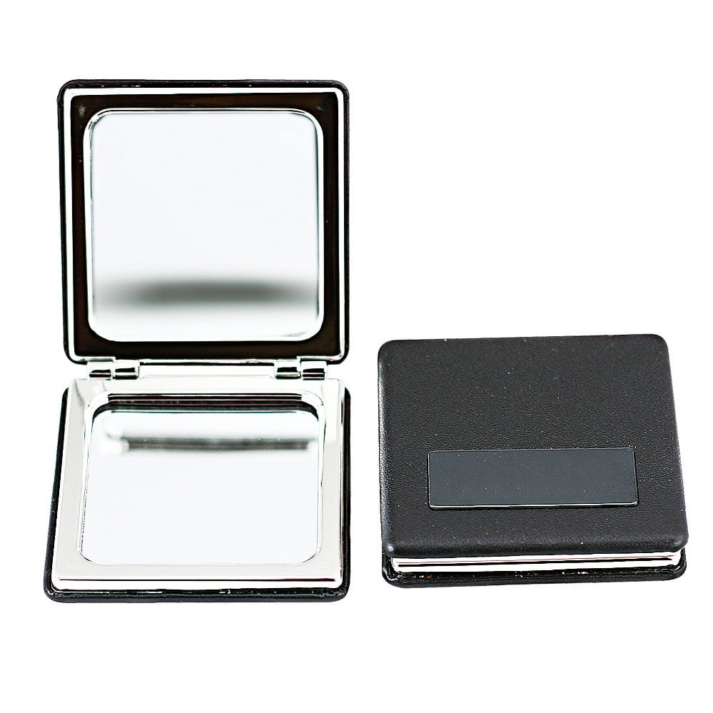 A compact mirror with a shiny interior and a black exterior. Features a logo on the front. Erica compact mirror - Image 1