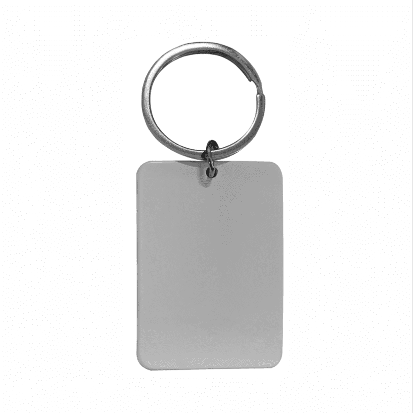 A keyring with a rectangular silver tag attached, featuring a plain surface and a metal loop. Freeman keyring - Image 1