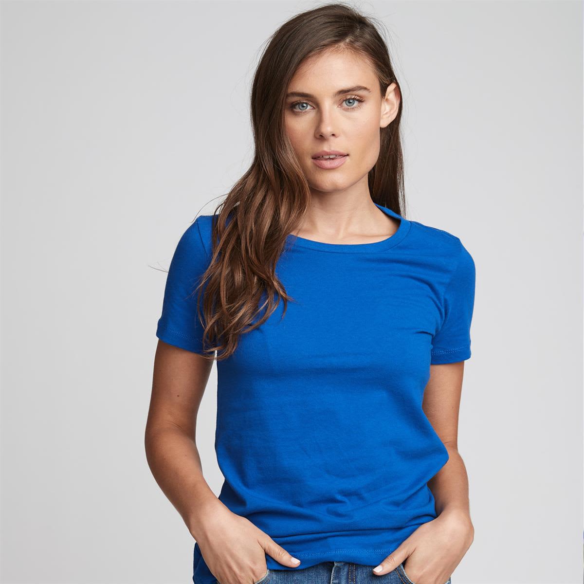 A woman wearing a fitted blue t-shirt, styled with a round neckline and short sleeves. The t-shirt features a logo. Women's Boyfriend Tee - Image 1