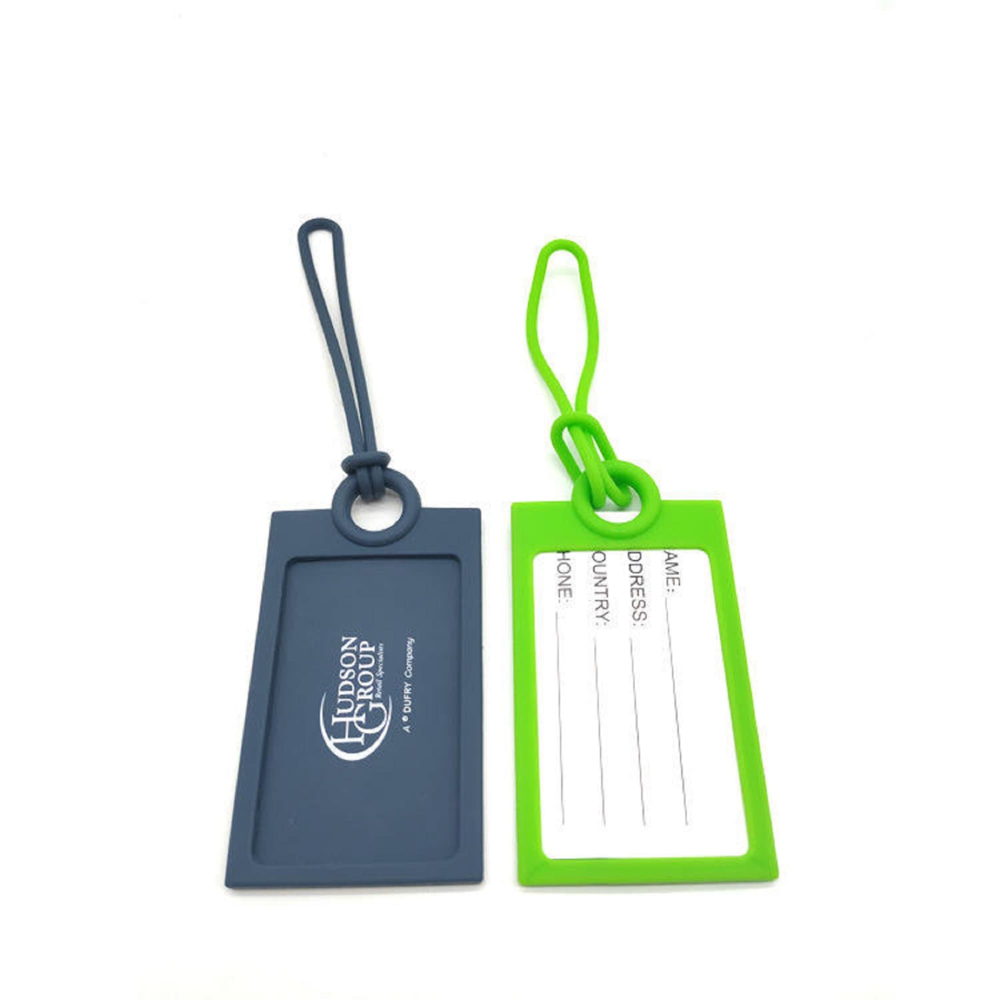 Two silicone luggage tags in navy blue and bright green, featuring a branding logo and space for personal information. Silicone Luggage Tag - Image 1