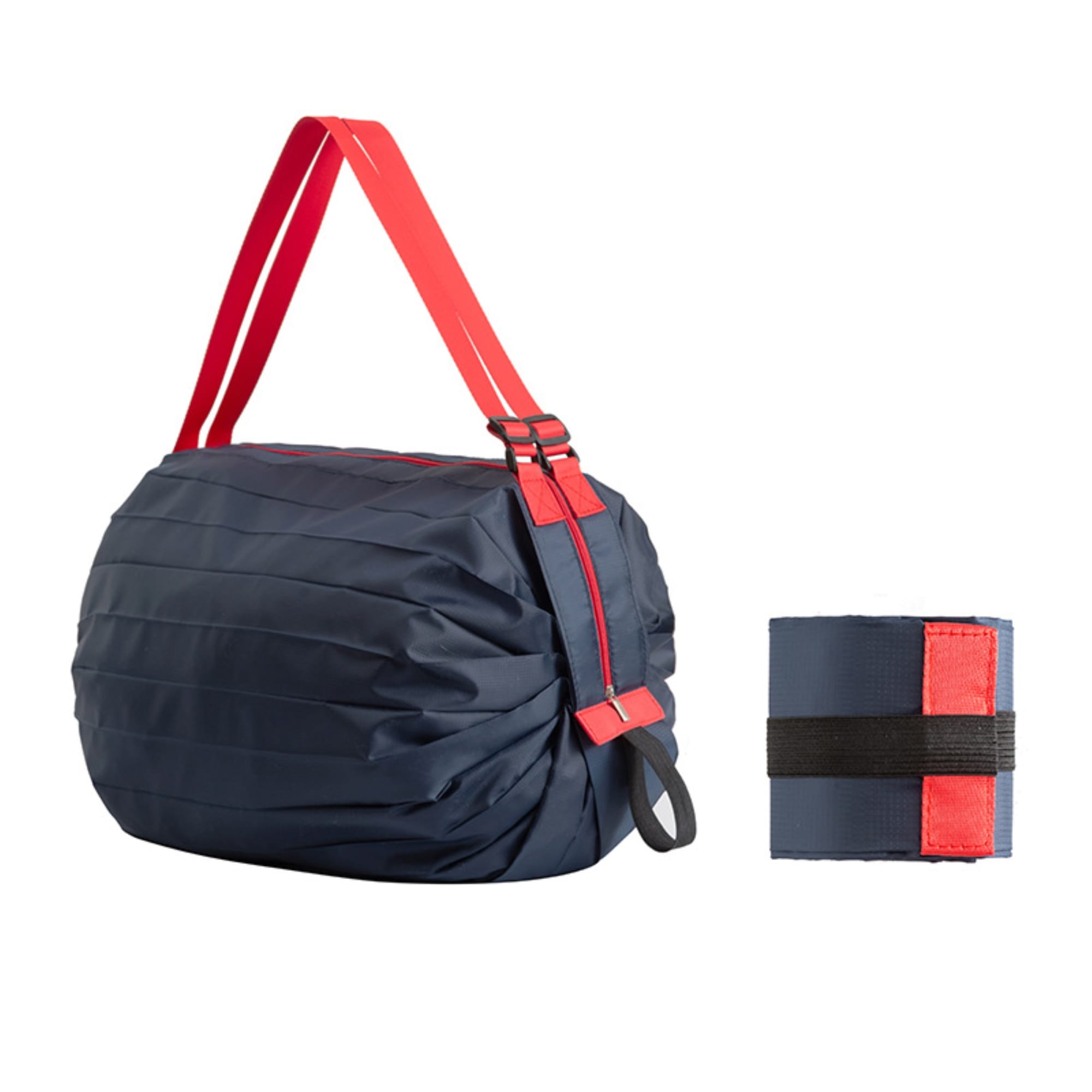 A foldable shopping bag in navy blue with bright red straps, displayed alongside its compact folded form. Foldable Shopping Bag - Image 1