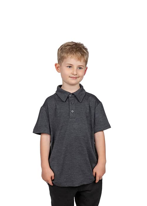A grey Kid's Challenger 100% polyester polo shirt on a child, featuring a collar and button placket. Kid's' Challenger 100% polyester Polo - Image 1