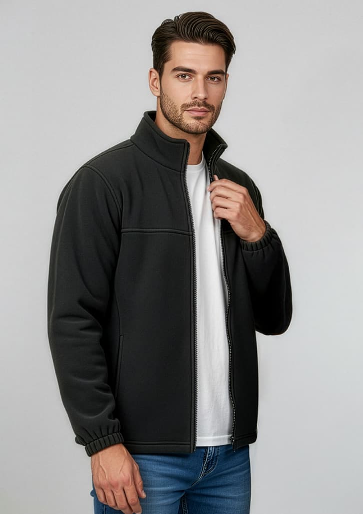 A black micro fleece jacket with a zip front and stand-up collar, worn by a model with a white t-shirt underneath. Mens Plain Jacket - Image 1