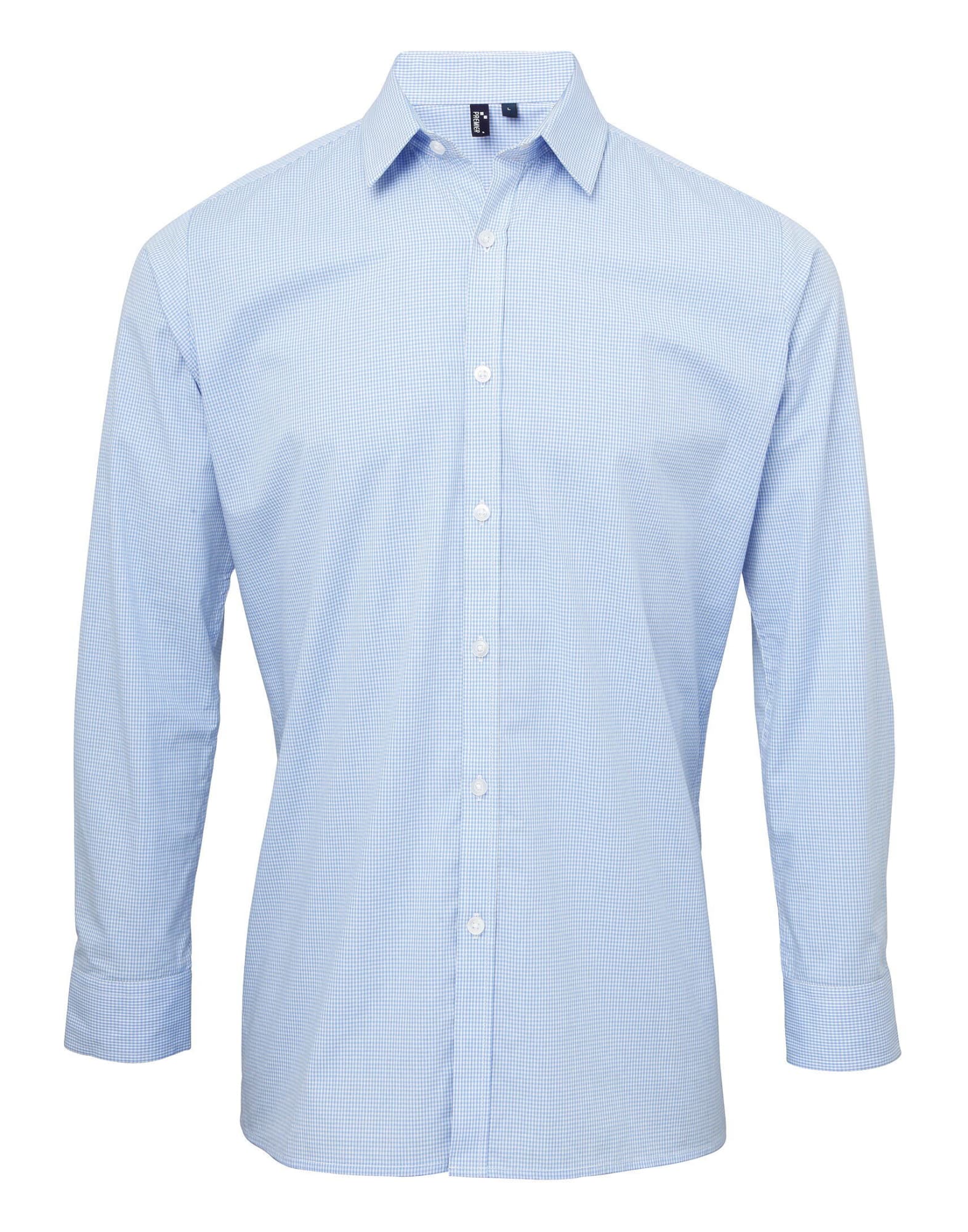 A light blue button-up shirt with long sleeves and a collar, featuring a logo on the chest. Microcheck L-S Cotton Shirt - Image 1